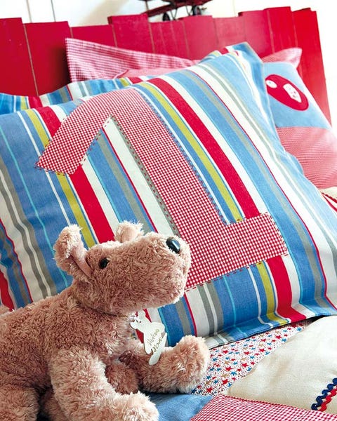 Stuffed toy, Blue, Toy, Textile, Linens, Room, Interior design, Plush, Teddy bear, Clothes hanger, 