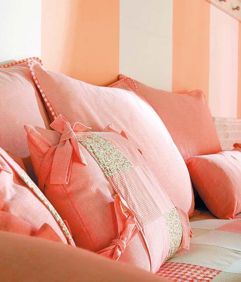 Textile, Orange, Peach, Interior design, Room, Pink, Carmine, Tan, Pillow, Bedding, 