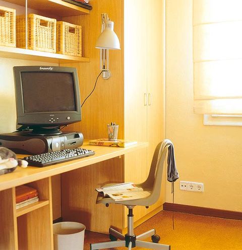 Wood, Room, Office chair, Table, Furniture, Display device, Interior design, Hardwood, Computer desk, Desk, 
