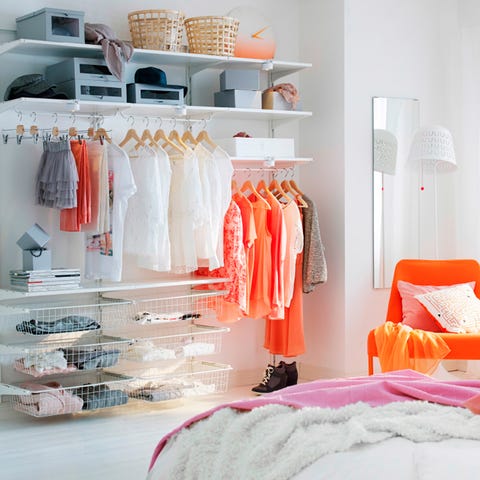 Room, Textile, Clothes hanger, Orange, Fashion, Linens, Retail, Home accessories, Collection, Boutique, 