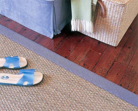 Floor, Flooring, Carpet, Costume accessory, Mat, Fedora, Costume hat, Rug, Crown, 