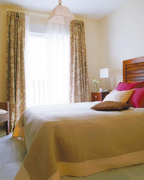 Room, Interior design, Bed, Yellow, Property, Textile, Bedding, Wall, Floor, Furniture, 