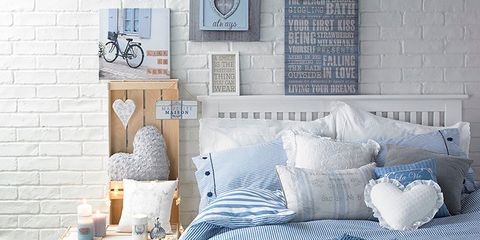 Blue, Room, Bed, Interior design, Textile, Bedding, Linens, Wall, Bedroom, Bed sheet, 