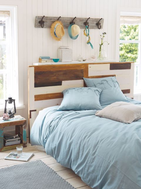 Blue, Wood, Room, Interior design, Bed, Bedding, Textile, Wall, Bedroom, Bed sheet, 