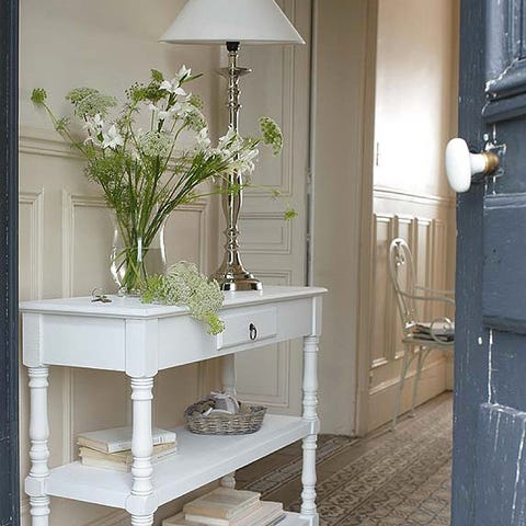 Room, Interior design, Lampshade, Wall, Light fixture, Interior design, Fixture, Home door, Bouquet, Artifact, 