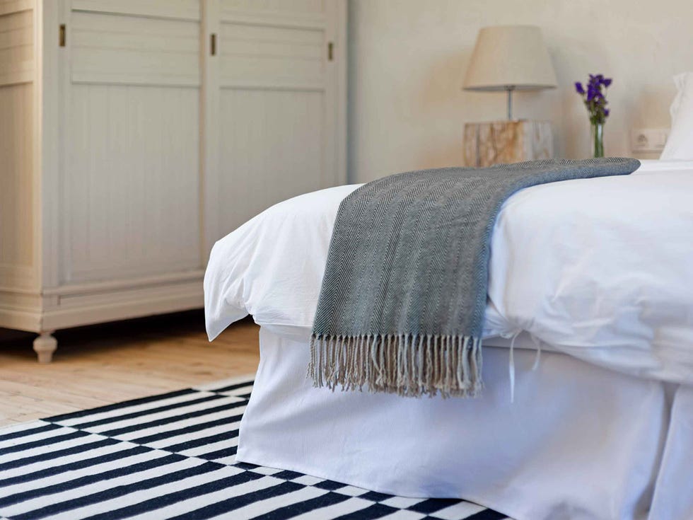 Bedroom, Bed sheet, Bedding, White, Bed, Furniture, Bed frame, Room, Floor, Duvet cover, 