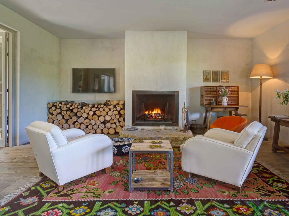 Living room, Room, Furniture, Fireplace, Interior design, Property, Hearth, Couch, Floor, Table, 