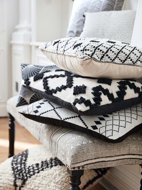 Furniture, Room, Interior design, Textile, Table, Bedding, Pillow, Pattern, Living room, Linens, 