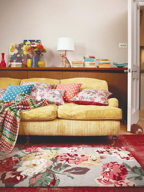 Room, Interior design, Yellow, Textile, Wall, Home, Red, Orange, Living room, Furniture, 