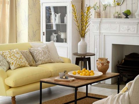 Living room, Furniture, Room, Yellow, Interior design, Couch, Property, Coffee table, Table, Home, 