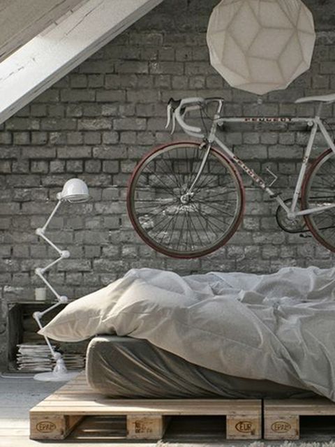 Wall, Bicycle wheel, Architecture, Furniture, Room, Vehicle, Bicycle, Tile, Table, Beige, 