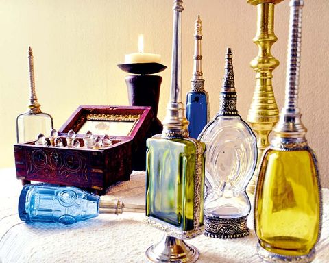 Liquid, Bottle, Perfume, Fluid, Oil, Glass bottle, Mustard oil, Still life photography, Candle holder, Cooking oil, 