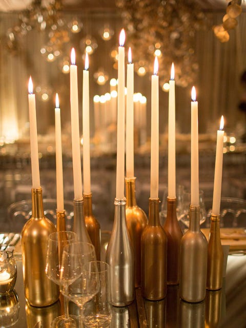 Candle, Lighting, Candle holder, Wine bottle, Glass bottle, Interior design, Glass, 