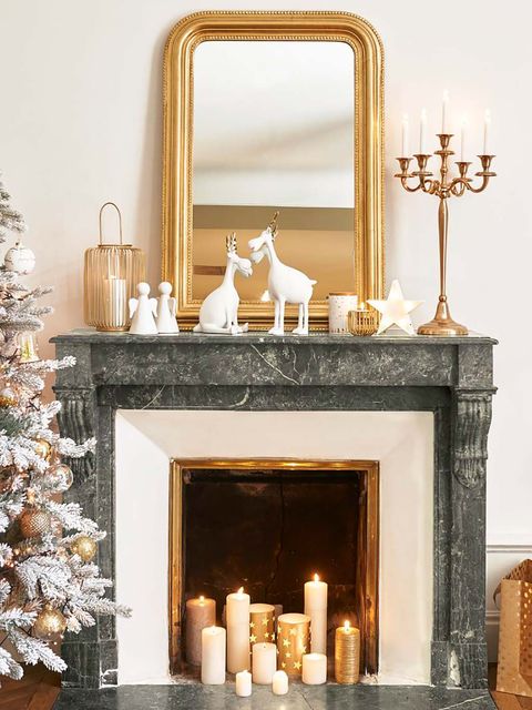 Hearth, Fireplace, Christmas stocking, Christmas decoration, Room, Interior design, Furniture, Home, Christmas, Material property, 