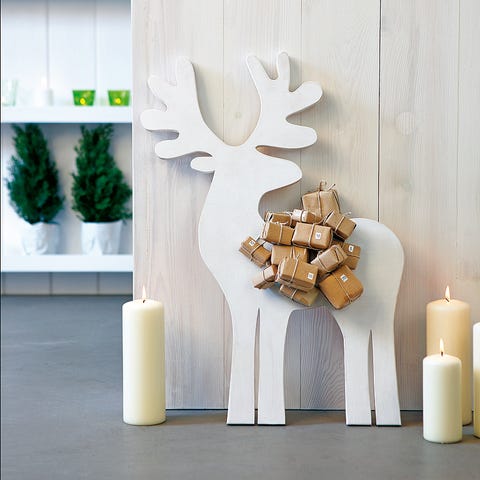 Lighting, Wall, Interior design, Candle, Antler, Design, Natural material, Wax, Wall sticker, Cylinder, 
