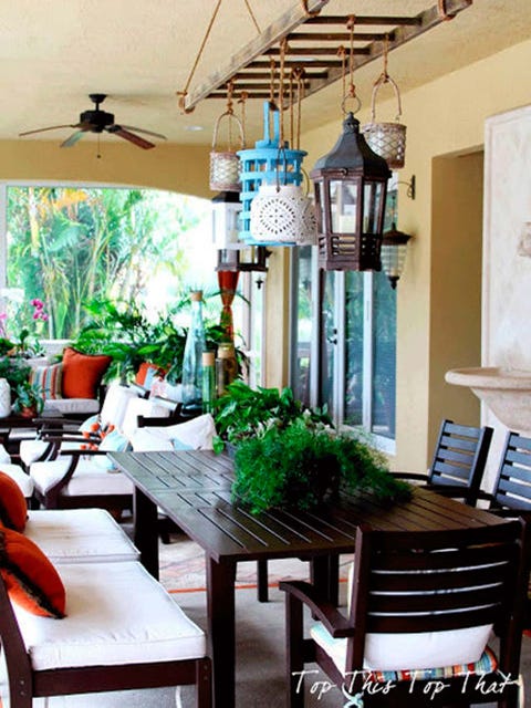 Lighting, Green, Room, Interior design, Furniture, Ceiling, Musical instrument, Light fixture, Table, Flowerpot, 