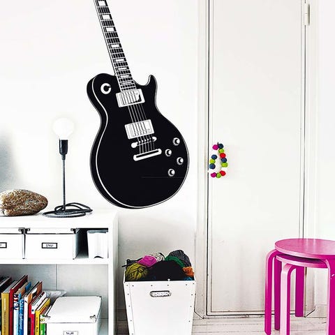 Plucked string instruments, String instrument, String instrument, Musical instrument, Guitar, Musical instrument accessory, Room, String instrument accessory, Wall, Folk instrument, 