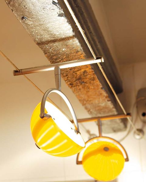 Yellow, Amber, Orange, Material property, Lighting accessory, Light fixture, Circle, Transparent material, Still life photography, Steel, 
