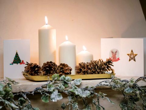 Candle, Lighting, Christmas, Christmas decoration, Interior design, Christmas eve, Candle holder, Room, Table, Plant, 