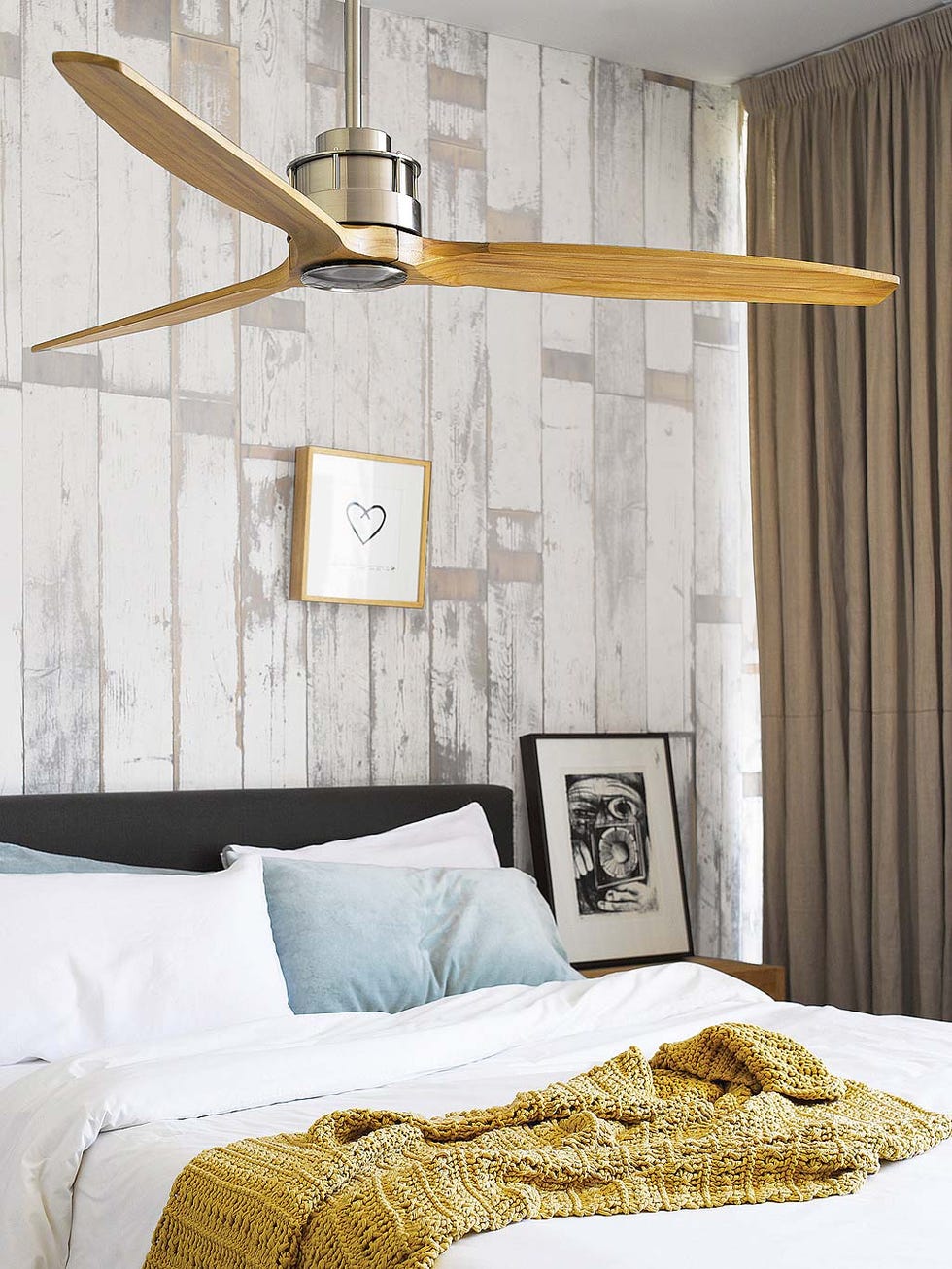 Bedroom, Furniture, Bed, Room, Ceiling fan, Ceiling, Interior design, Yellow, Wall, Bed sheet, 