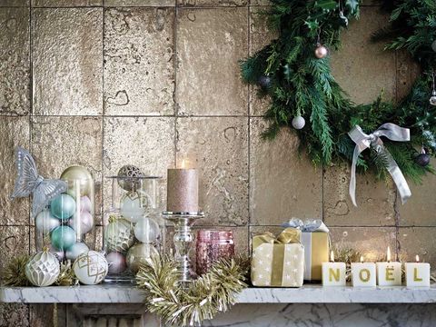 Wall, Lighting, Christmas decoration, Twig, Tree, Floral design, Floristry, Branch, Room, Shelf, 