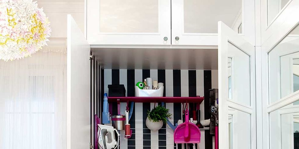 Laundry room, Washing machine, Room, Shelf, Laundry, Furniture, Major appliance, Pink, Clothes dryer, Cupboard, 