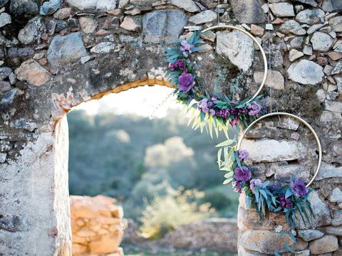 Arch, Wall, Stone wall, Flower, Architecture, Plant, Floral design, Wildflower, Door, 