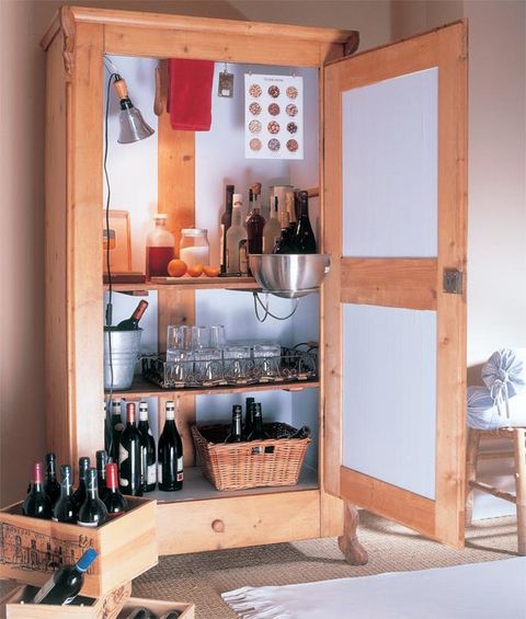 Shelving, Bottle, Wood stain, Cupboard, Shelf, Plywood, Glass bottle, Cabinetry, Peach, Collection, 