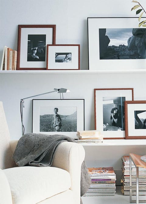 Room, Wall, Interior design, Linens, Shelving, Bedding, Grey, Picture frame, Collection, Shelf, 