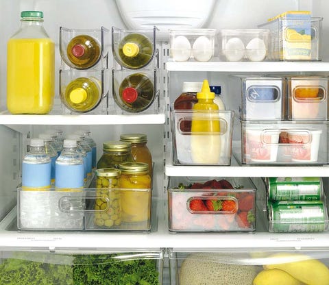 Fluid, Liquid, Yellow, Bottle, Major appliance, Food storage containers, Freezer, Kitchen appliance, Fruit, Home appliance, 
