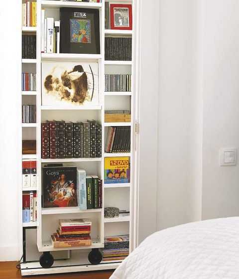 Room, Shelf, Shelving, Interior design, Wall, Bed, Furniture, Linens, Publication, Collection, 