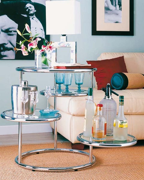 Room, Serveware, Interior design, Wall, Teal, Turquoise, Dishware, Picture frame, Drinkware, Aqua, 