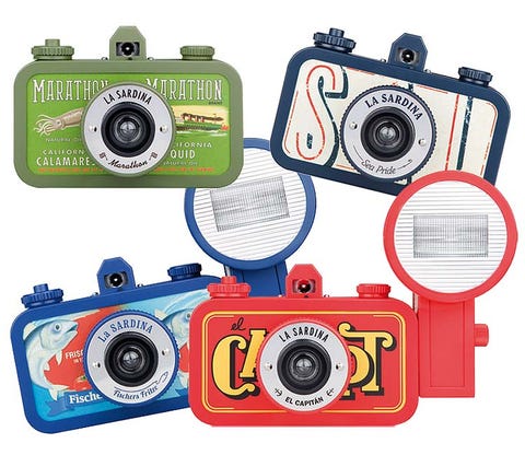 Electronic device, Cameras & optics, Lens, Film camera, Technology, Digital camera, Font, Camera accessory, Camera lens, Circle, 
