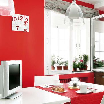 Room, Interior design, Red, Table, Display device, Furniture, Interior design, Flat panel display, Light fixture, Television accessory, 