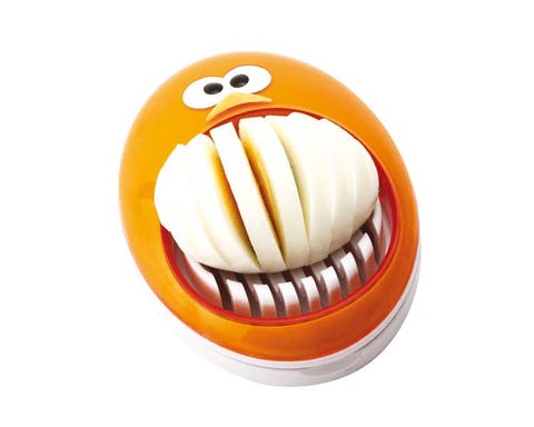 Orange, Amber, Fictional character, Tooth, Animated cartoon, Graphics, Baked goods, Moustache, 