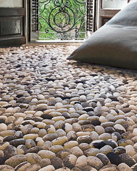 Flooring, Floor, Linens, Bedding, Natural material, Circle, Pebble, Bed sheet, Pillow, Home accessories, 