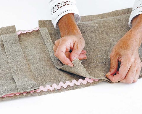 Finger, Textile, Wrist, Nail, Pattern, Beige, Thumb, Creative arts, Thread, Linens, 