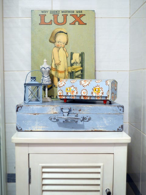 Gas, Tile, Stove, Silver, Vintage clothing, Machine, Cabinetry, Kitchen appliance accessory, Drawer, Major appliance, 