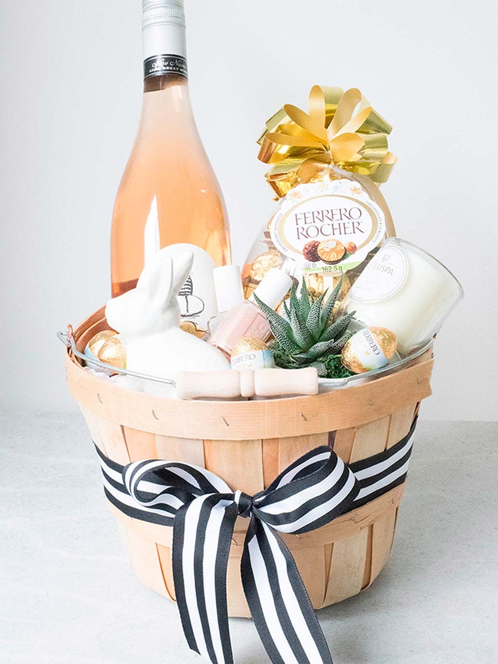 Bottle, Glass bottle, Peach, Orange, Home accessories, Present, Flowering plant, Label, Bottle cap, Basket, 