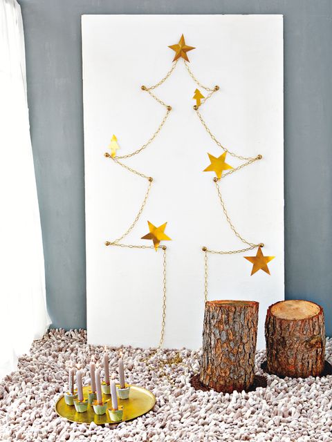 Yellow, Wood, Christmas decoration, Art, Interior design, Trunk, Creative arts, Christmas, Natural material, Craft, 