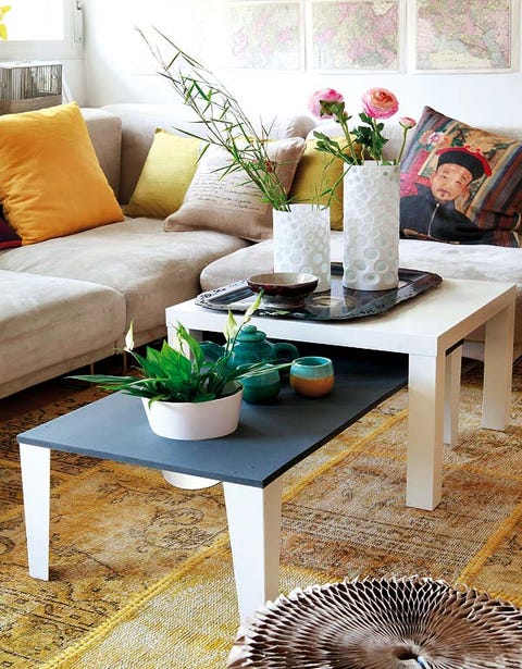 Room, Interior design, Furniture, Couch, Interior design, Table, Petal, Living room, Home, Vase, 