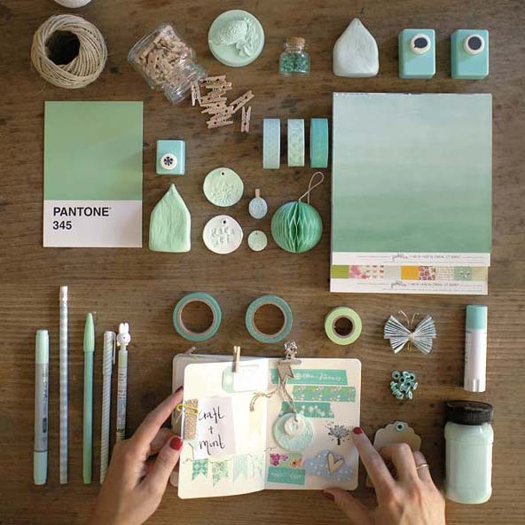 Finger, Hand, Teal, Paper product, Nail, Turquoise, Paper, Stationery, Paint, Circle, 