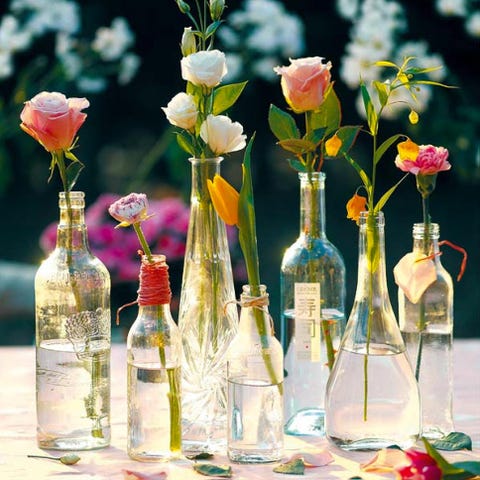 Glass, Bottle, Glass bottle, Drinkware, Barware, Petal, Flower, Floristry, Artifact, Cut flowers, 