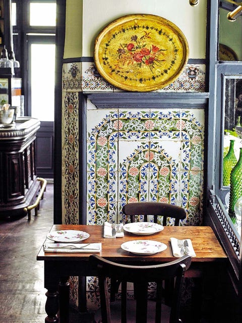 Interior design, Table, Room, Furniture, Serveware, Porcelain, Visual arts, Dishware, Holy places, Creative arts, 