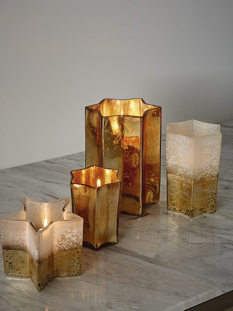 Lighting, Candle holder, Candle, Still life photography, Interior design, Cylinder, Light fixture, 