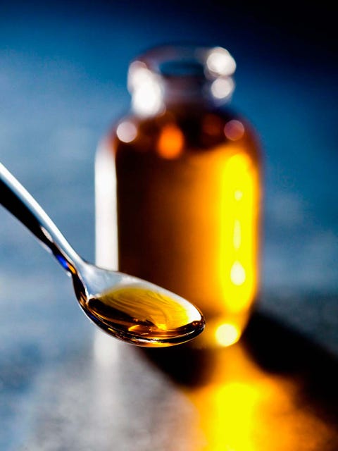 Honey, Liquid, Spoon, Cutlery, Drink, Alcohol, Glass bottle, Tableware, Syrup, 