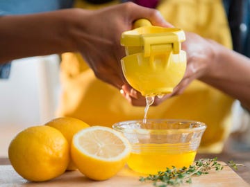 Finger, Yellow, Citrus, Food, Fruit, Ingredient, Drink, Natural foods, Produce, Tableware, 