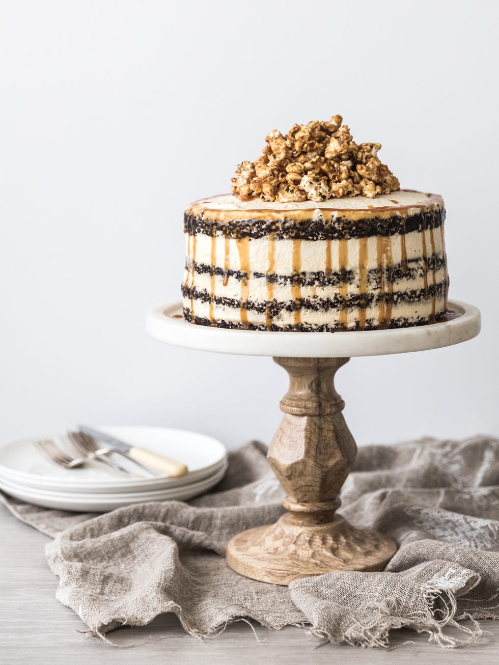 Serveware, Grey, Natural material, Sweetness, Home accessories, Dishware, Still life photography, Cake stand, Dessert, Silver, 