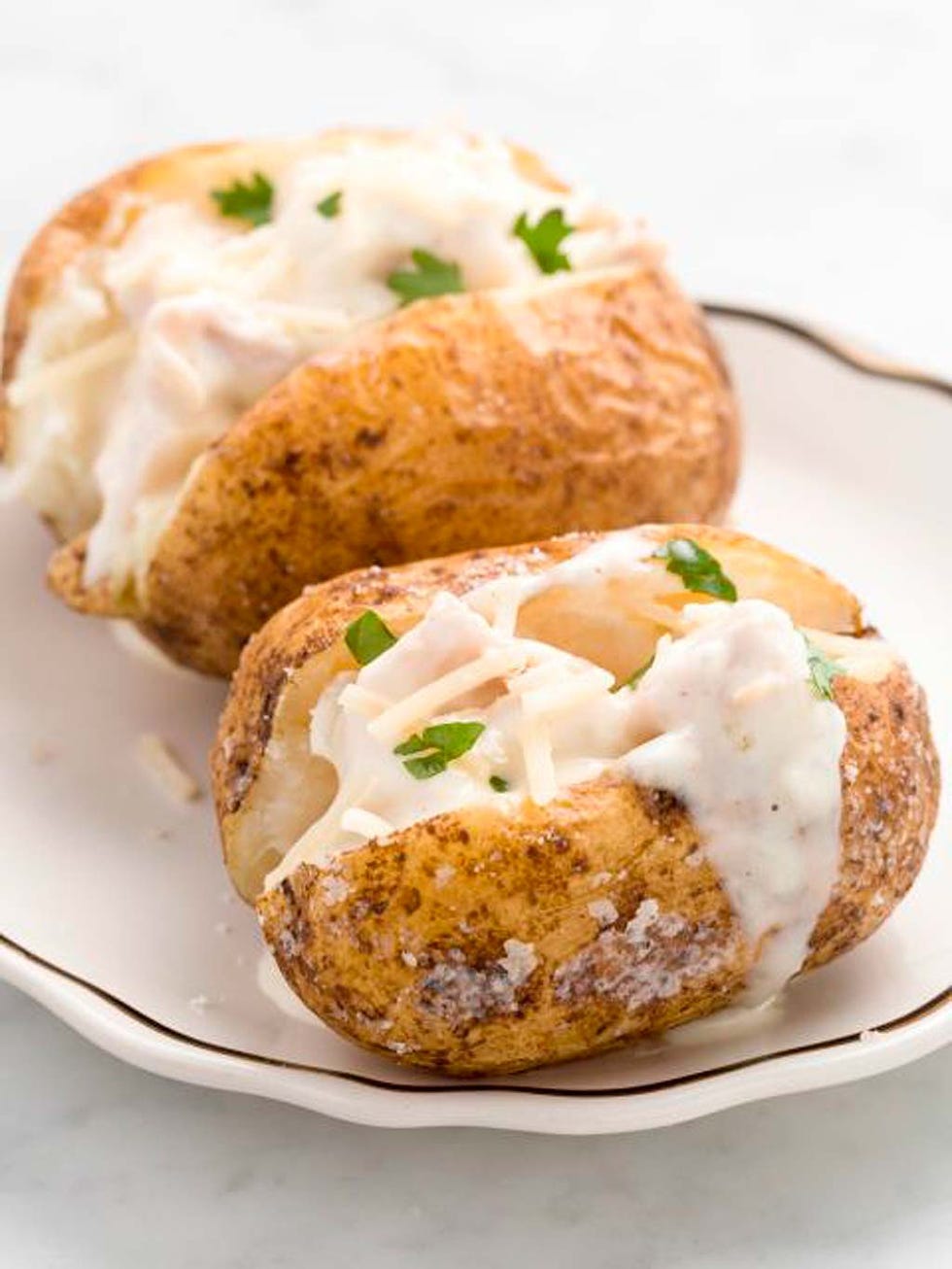 Dish, Food, Cuisine, Potato, Ingredient, Sour cream, Baked potato, Root vegetable, Solanum, Fried food, 