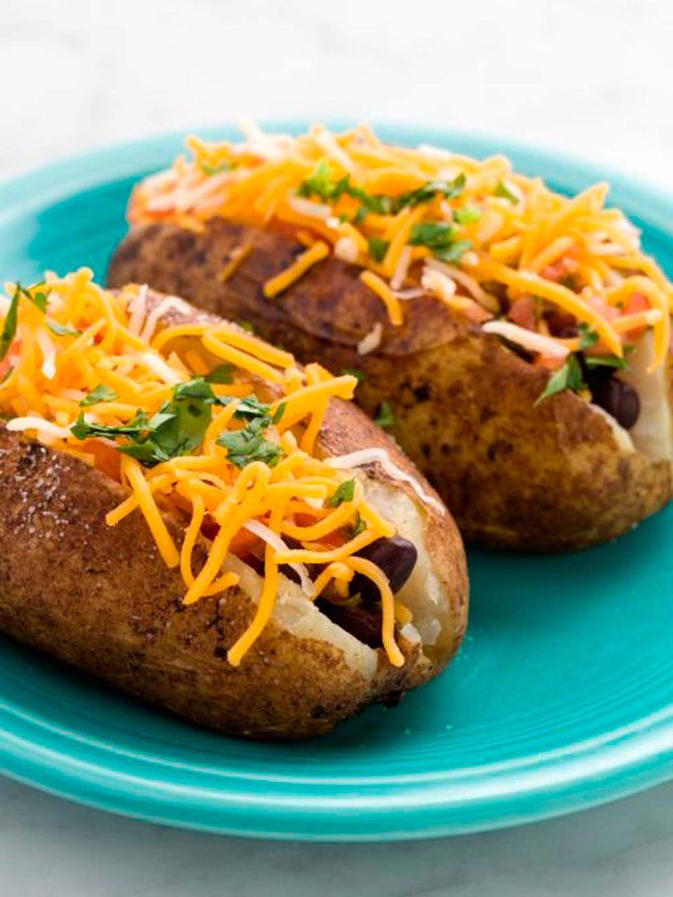 Dish, Food, Cuisine, Potato, Root vegetable, Ingredient, Baked potato, Solanum, Produce, Staple food, 